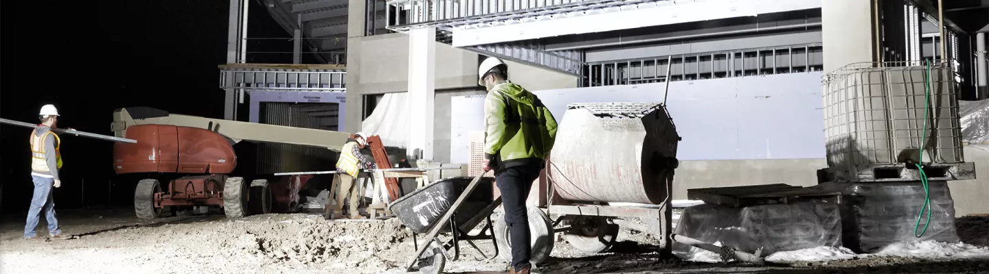 Light stand providing light on construction site
