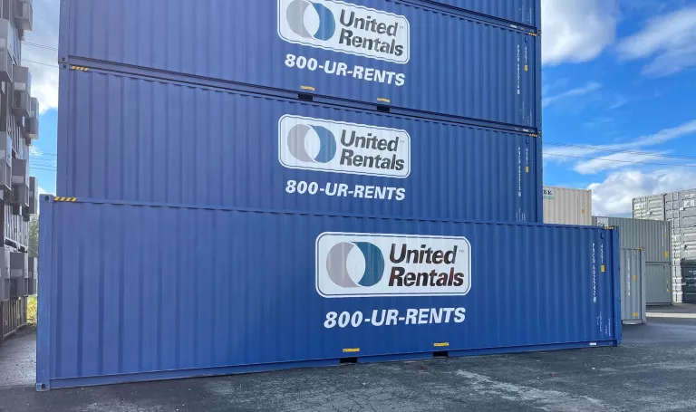 three blue storage containers stacked on each other