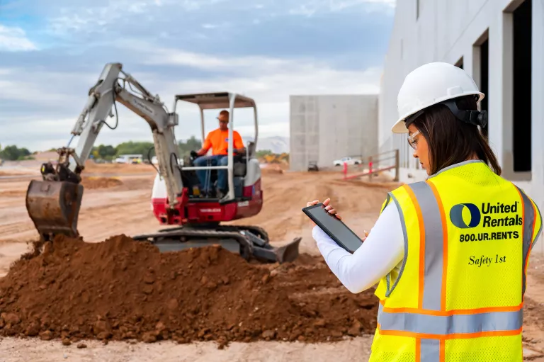 Jobsite excavator and tablet