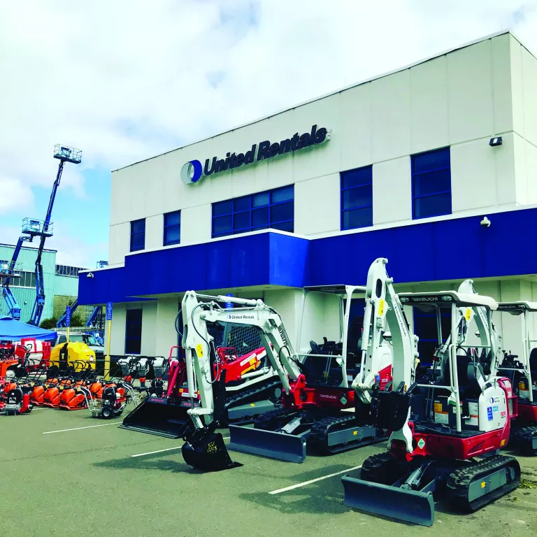 construction equipment in front of united rentals branch
