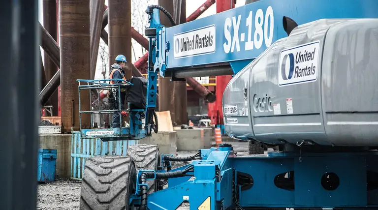 Blue Genie boom lift on a jobsite