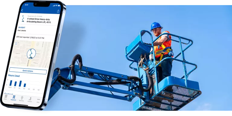 Phone displaying the united rentals mobile app next to a worker on a blue boom lift