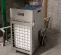 Silver Abatement electric Air Scrubber with 2,400 CFM in the floor of a basement