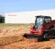 White and Black and Red TAKEUCHI 2,400-2,800 lb. Compact Track Loader