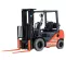 Orange and black warehouse forklift with pneumatic tires