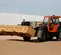 Orange and beige telehandler