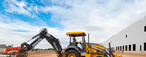 Track loader on jobsite