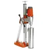 Orange and silver HUSQVARNA Concrete Core Drill, 13-15 Amps, Electric Powered