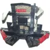 red and black tree shear attachment for loader