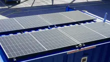  Purpose-built mobile site office made from a shipping container, equipped for on-site operations and easy transport.