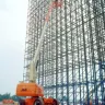 Straight Boom Lift Extending in Construction Site