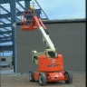 Articulating Boom Lift In Construction Site