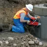 Concrete Chain Saw In Construction Site
