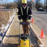 Vibratory Plate Compactor In Action on asphalt