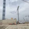 storage containers beneath cranes