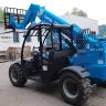 Blue Genie 5,000 lb. telehandler reach forklift parked outside of a building