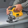 Black and yellow Dewalt DW331K jigsaw cutting a countertop