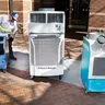 Spot coolers outside of a building