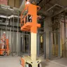 Vertical Mast Lift Building Site