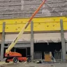 Straight Boom Lift Construction Site