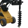 yellow skid steer with a black auger attachment